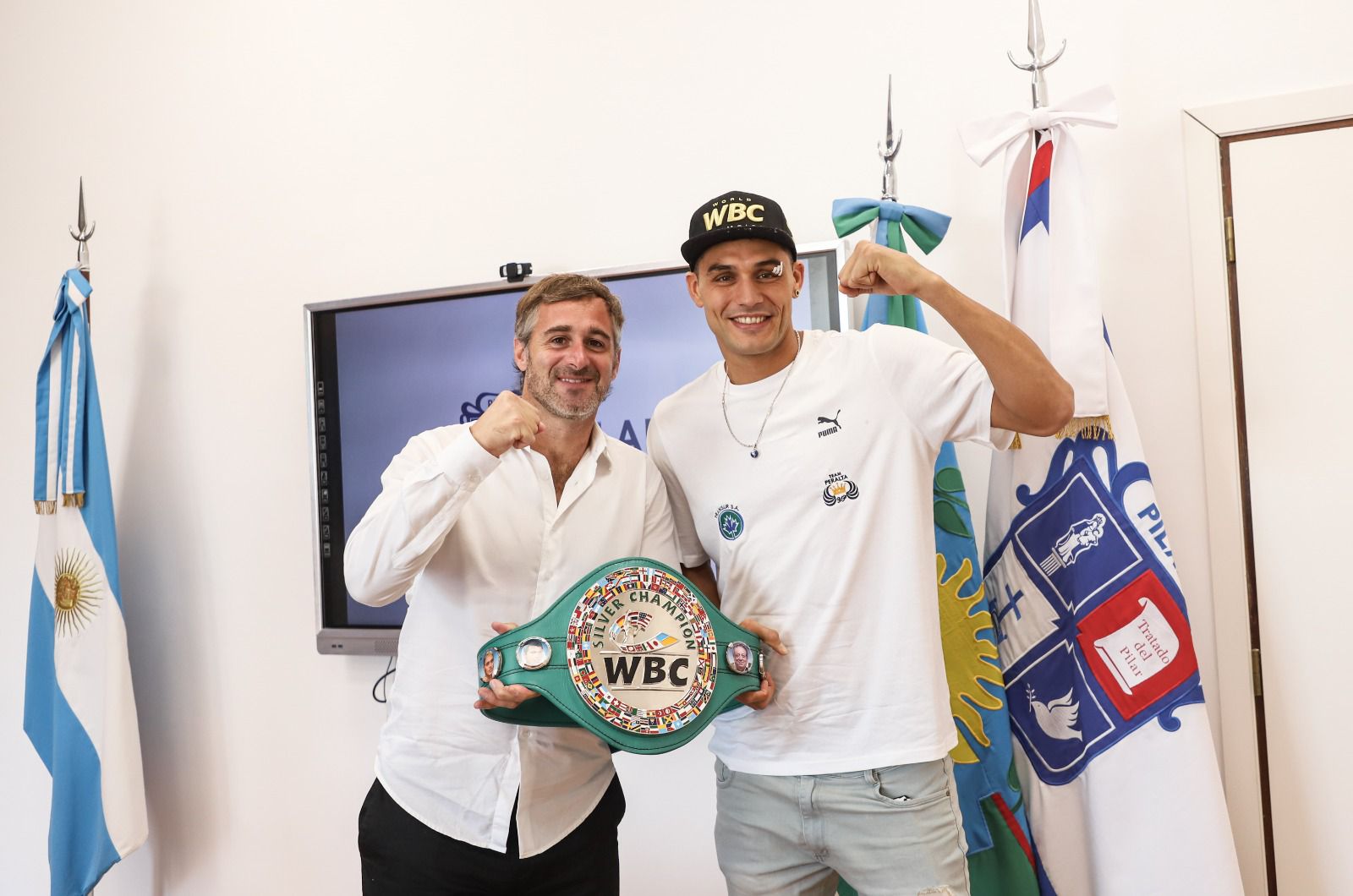 Achával recibió al flamante campeón Yamil Peralta
